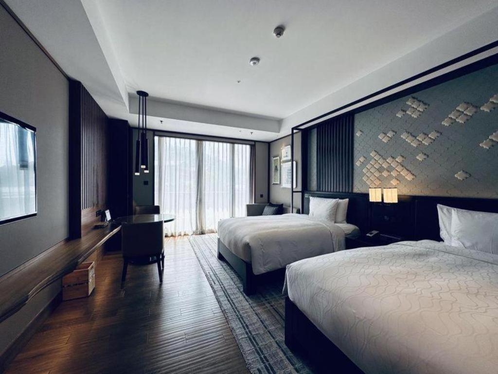 Отель Xianghu Xiaoyao Manor Ханчжоу Экстерьер фото